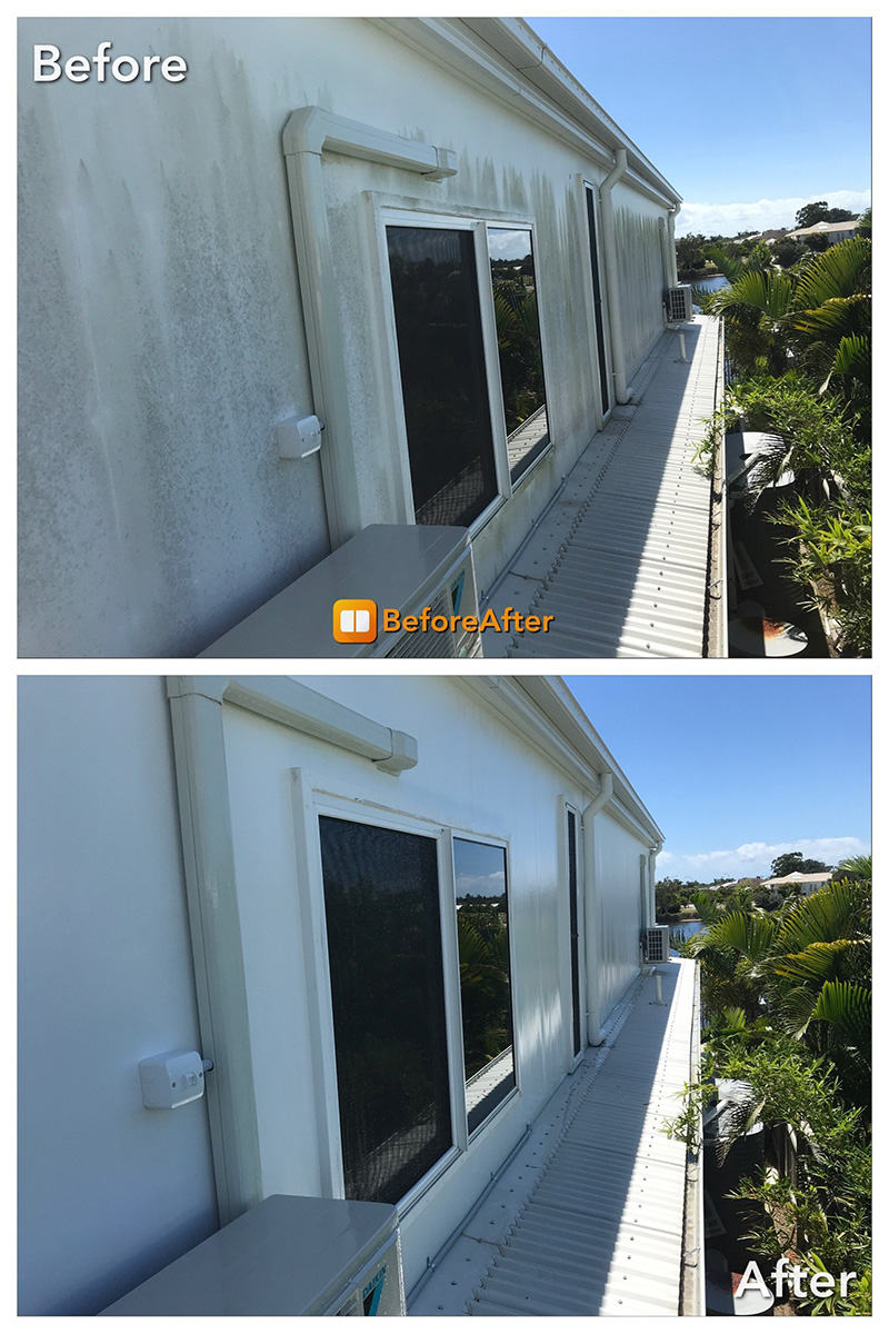 Before and after house washing on rendered brick home