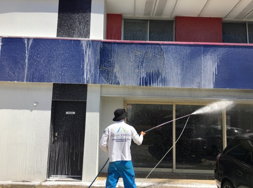 Aqua Fresh Cleaning Services Pty Ltd conducting pressure washing service in Brisbane City